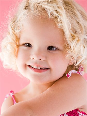 little girl sticking her tongue out. Stock Photo - Premium Royalty-Free, Code: 640-02777401