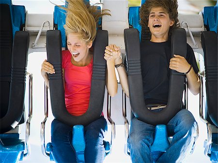 roller-coaster - jeune couple dans un parc d'attractions Photographie de stock - Premium Libres de Droits, Code: 640-02777754