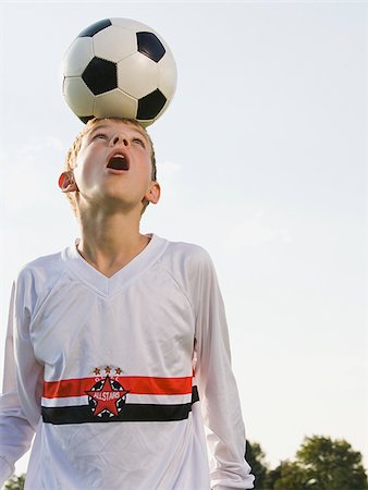 simsearch:640-02777987,k - young soccer player Stock Photo - Premium Royalty-Free, Code: 640-02777885