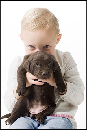simsearch:640-06050836,k - child with puppy Stock Photo - Premium Royalty-Free, Code: 640-02778159