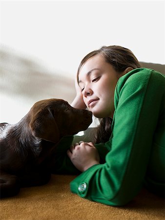 simsearch:640-02658715,k - young woman with a brown puppy Stock Photo - Premium Royalty-Free, Code: 640-02778293