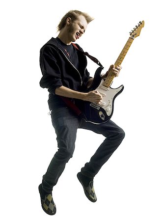 Man playing guitar Foto de stock - Royalty Free Premium, Número: 640-02778466