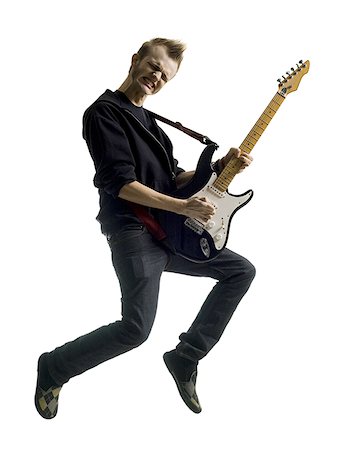 rock and roll - Man playing guitar Stock Photo - Premium Royalty-Free, Code: 640-02778467