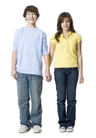 young couple holding hands Stock Photo - Premium Royalty-Free, Code: 640-02778556