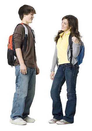 Students with book bags posing Stock Photo - Premium Royalty-Free, Code: 640-02778587