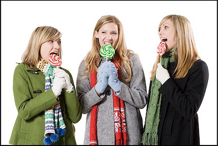 girls with lollipops Stock Photo - Premium Royalty-Free, Code: 640-02778624