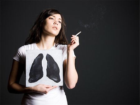 Woman smoker Stock Photo - Premium Royalty-Free, Code: 640-02778815