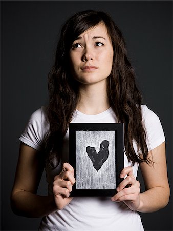 female broken heart - Sad woman Stock Photo - Premium Royalty-Free, Code: 640-02778811