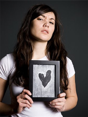 female broken heart - Sad woman Stock Photo - Premium Royalty-Free, Code: 640-02778812