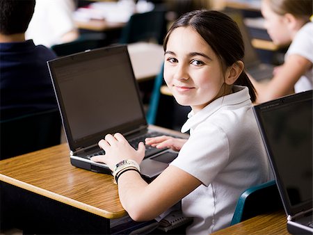 girl with laptop at school Stock Photo - Premium Royalty-Free, Code: 640-02778935