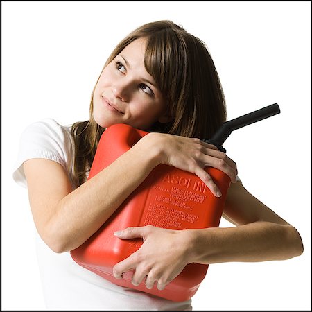 woman with a gas can Stock Photo - Premium Royalty-Free, Code: 640-02779182