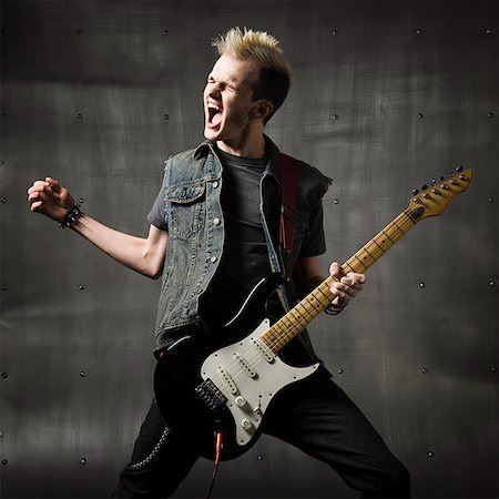 rock and roll - man with a mohawk Stock Photo - Premium Royalty-Free, Code: 640-02779219