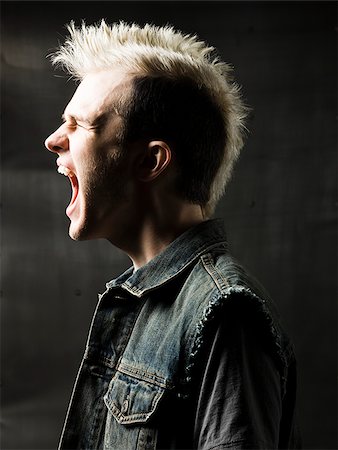 rock and roll - man with a mohawk Stock Photo - Premium Royalty-Free, Code: 640-02779222