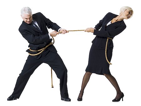 simsearch:640-01360534,k - Businessman and businesswoman in a tug of war Foto de stock - Royalty Free Premium, Número: 640-02770086