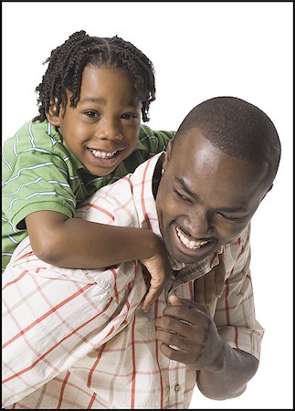 simsearch:640-02770204,k - Father playing with young son Foto de stock - Royalty Free Premium, Número: 640-02770158