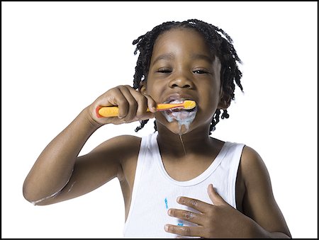simsearch:640-03260960,k - Boy brushing his teeth Stock Photo - Premium Royalty-Free, Code: 640-02770232