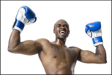 Boxer celebrating victory Stock Photo - Premium Royalty-Free, Code: 640-02770251