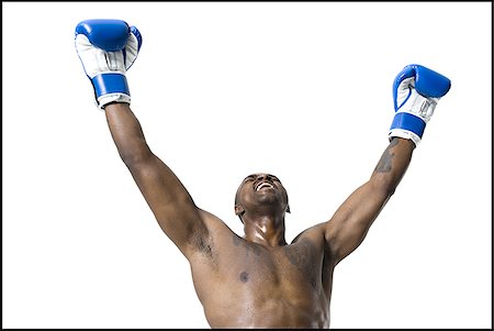 Boxer celebrating victory Stock Photo - Premium Royalty-Free, Code: 640-02770252