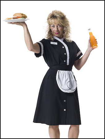 person and cut out and waiter - Waitress holding hamburger platter and orange soda Stock Photo - Premium Royalty-Free, Code: 640-02770269