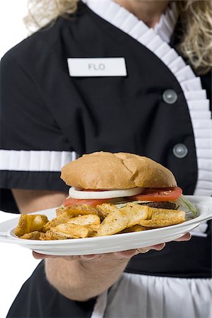 person and cut out and waiter - Waitress holding hamburger platter Stock Photo - Premium Royalty-Free, Code: 640-02770271