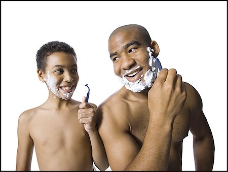 simsearch:640-02770419,k - Father and son shaving together Stock Photo - Premium Royalty-Free, Code: 640-02770417