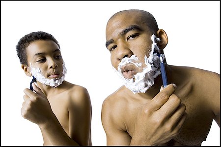 simsearch:640-02770419,k - Father and son shaving together Stock Photo - Premium Royalty-Free, Code: 640-02770418