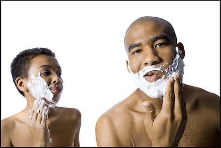 father and son and shave - Father and son shaving together Stock Photo - Premium Royalty-Free, Code: 640-02770412