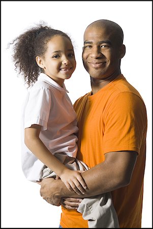 simsearch:640-02770419,k - Father holding young daughter Stock Photo - Premium Royalty-Free, Code: 640-02770427