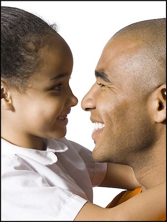 simsearch:640-02770204,k - Father holding young daughter Stock Photo - Premium Royalty-Free, Code: 640-02770429