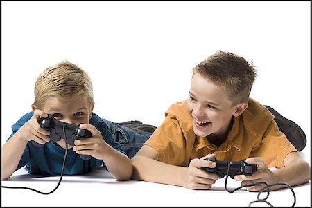 simsearch:640-02769084,k - Two brothers playing a video game Stock Photo - Premium Royalty-Free, Code: 640-02770445