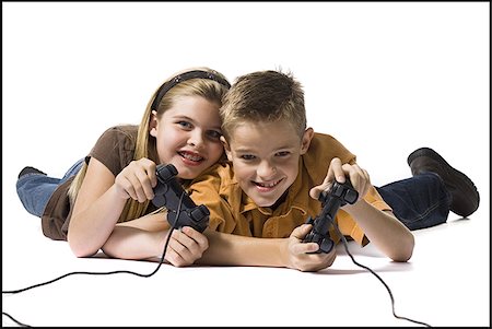 simsearch:640-02769084,k - Brother and sister playing a video game Stock Photo - Premium Royalty-Free, Code: 640-02770451