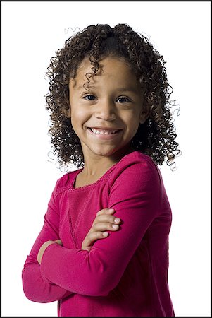 simsearch:640-02770515,k - Young girl with crossed arms Foto de stock - Royalty Free Premium, Número: 640-02770494