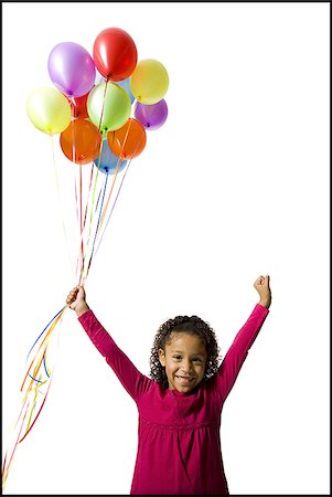 simsearch:640-02770515,k - Young girl holding balloons Foto de stock - Royalty Free Premium, Número: 640-02770502