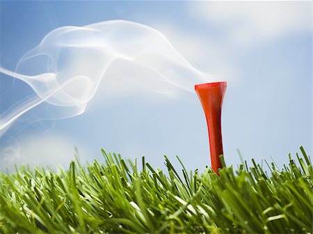 smoke green - Smoking golf tee Stock Photo - Premium Royalty-Free, Code: 640-02770547