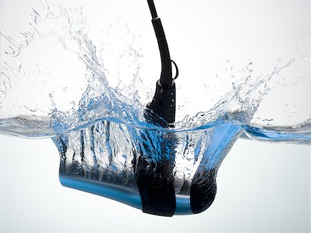 electrocuted - Hair dryer dropped in water Stock Photo - Premium Royalty-Free, Code: 640-02770541