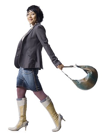 simsearch:640-02770635,k - Woman with knee high boots and handbag Stock Photo - Premium Royalty-Free, Code: 640-02770635