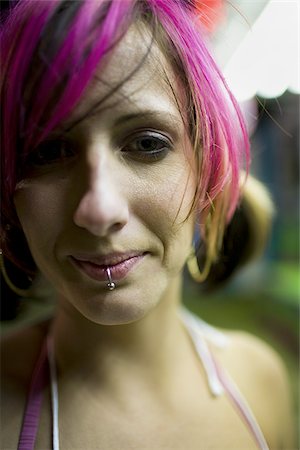 Female punk with dyed pink hair Stock Photo - Premium Royalty-Free, Code: 640-02770771