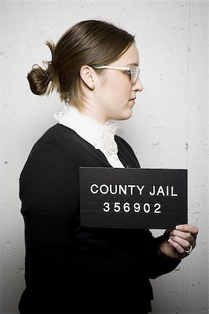female in jail - Mug shot de bibliothécaire Photographie de stock - Premium Libres de Droits, Code: 640-02770803