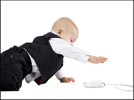 simsearch:640-01351279,k - Baby Boy in suit crawling to computer mouse Stock Photo - Premium Royalty-Free, Code: 640-02770870