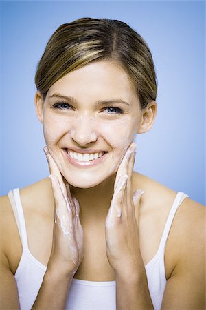 Woman washing face Stock Photo - Premium Royalty-Free, Code: 640-02770949