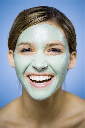 skin treatment medical - Woman with facial mask smiling Foto de stock - Sin royalties Premium, Código: 640-02770951