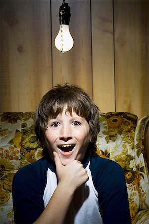 simsearch:640-02771097,k - Close-up of boy with light bulb Stock Photo - Premium Royalty-Free, Code: 640-02771089