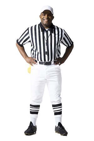 simsearch:640-02770178,k - Referee standing with arms crossed Foto de stock - Royalty Free Premium, Número: 640-02771156