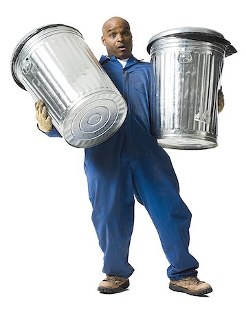 Garbage man with trash cans Stock Photo - Premium Royalty-Free, Code: 640-02771186