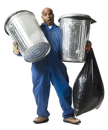 Garbage man with trash cans Stock Photo - Premium Royalty-Free, Code: 640-02771187