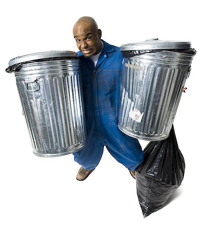 Garbage man with trash cans Stock Photo - Premium Royalty-Free, Code: 640-02771190