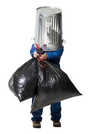 Garbage man with trash can on head Stock Photo - Premium Royalty-Free, Code: 640-02771203