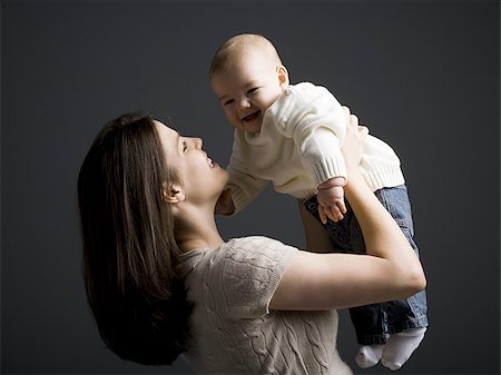 simsearch:640-01351279,k - Mother holding baby boy Stock Photo - Premium Royalty-Free, Code: 640-02771210