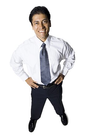 simsearch:640-01348387,k - Businessman with arms crossed looking up smiling Stock Photo - Premium Royalty-Free, Code: 640-02771254
