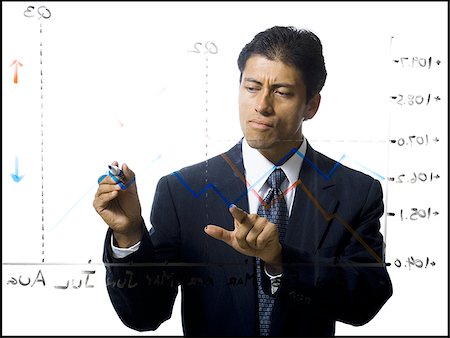 simsearch:640-02771261,k - Businessman calculating earnings Stock Photo - Premium Royalty-Free, Code: 640-02771264